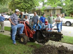 Oakley CA sprinkler repair team with the trencher